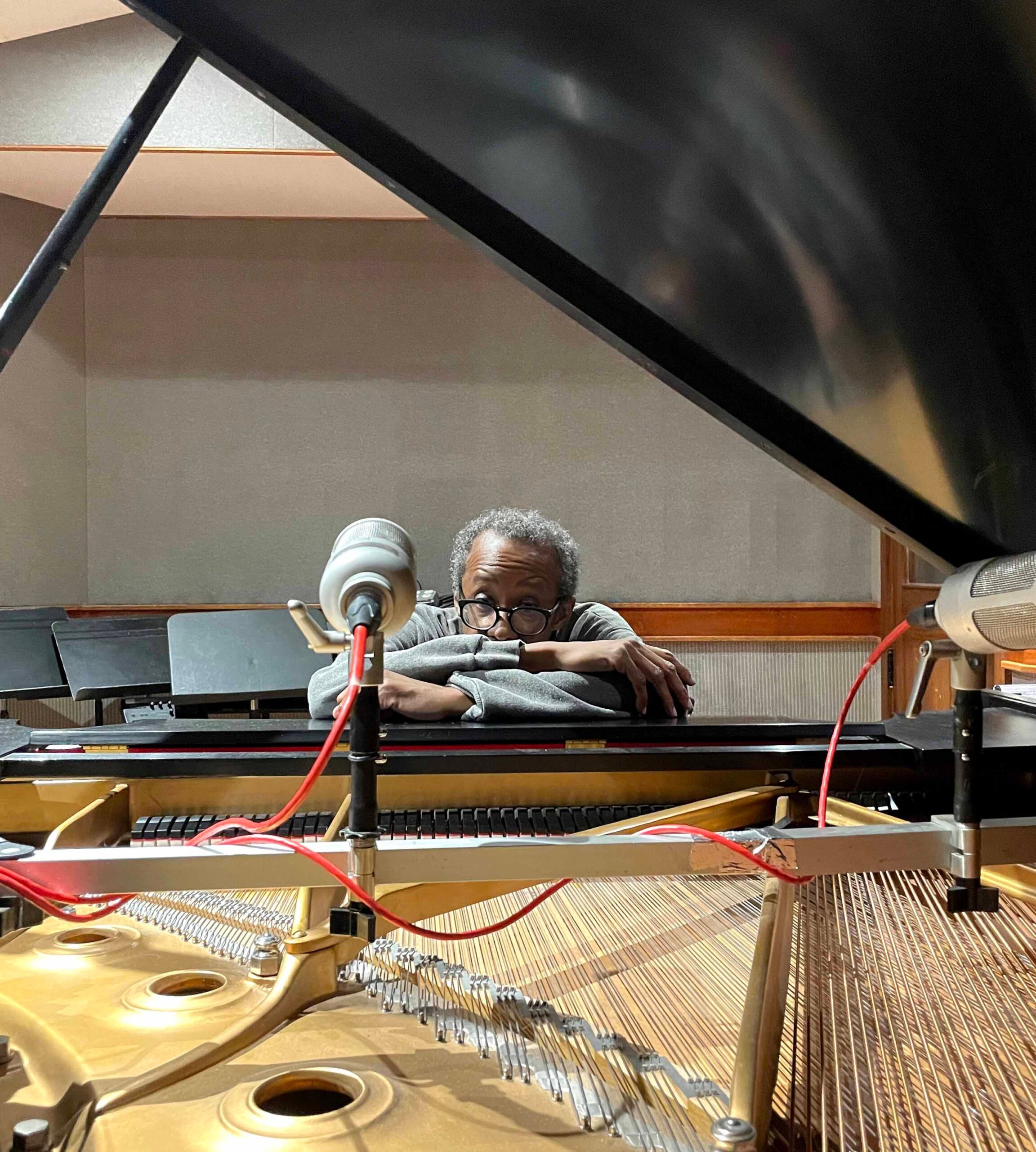 Matt Shipp at the piano with microphones